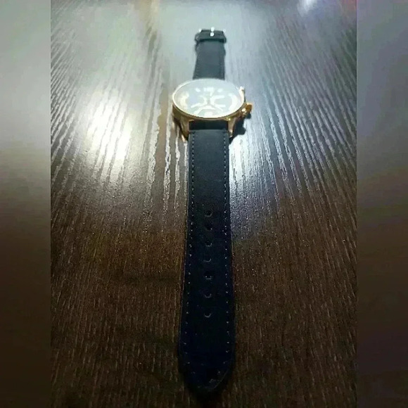 Men's black and gold tone watch - Picture 3 of 5